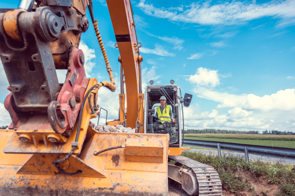 Person using an excavator