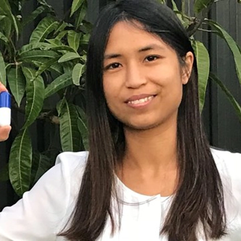 Michelle Ta holding capsule