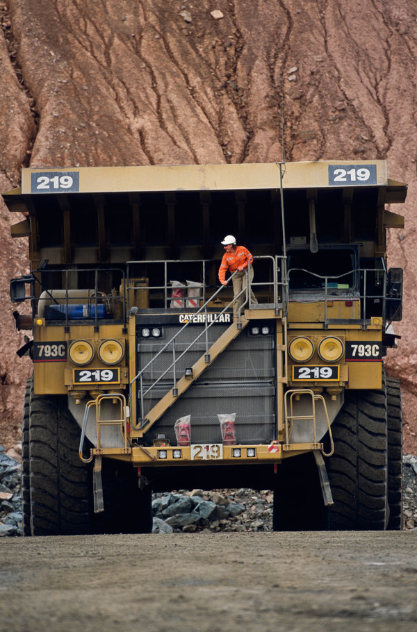 Person standing on a huge truck