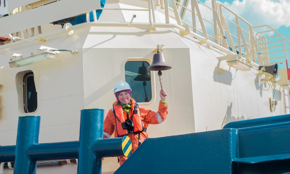 Mariner ringing the bell in a ship